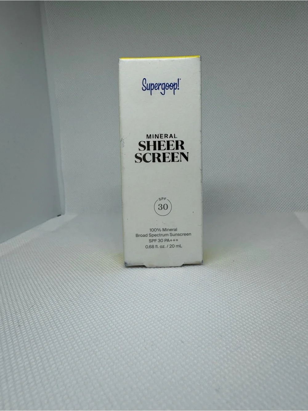 Supergoop! White Tube Sunscreen with Bright Yellow Cap